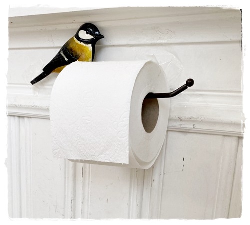Superleuke toiletrolhouder met vogeltje.