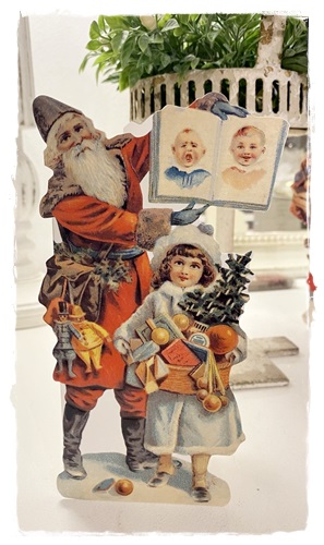 Victoriaanse kerstkaart gestanst en in reliëf van Father Christmas, child, 18 x 10 cm. kan staan, met enveloppe