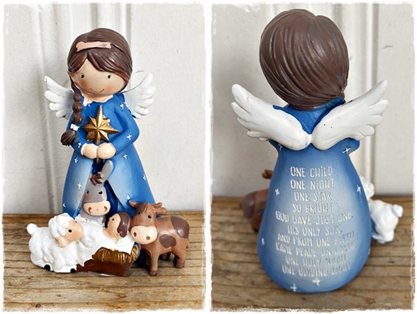 Engel met baby Jezus en diertjes.