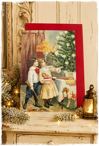Victoriaanse Kerstkaart afm. 11,5 x 17 cm. afb. Broer en zusje plus rode enveloppe